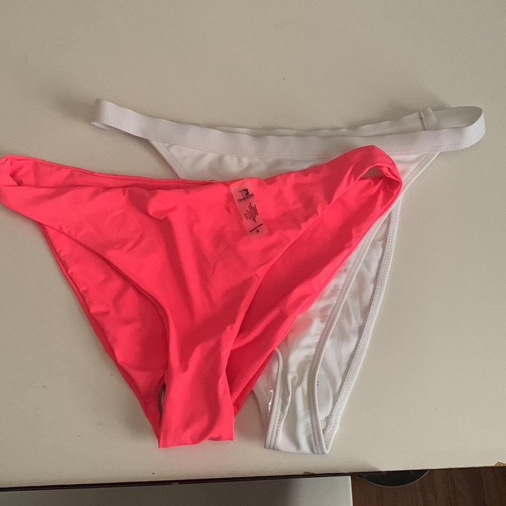 2 pairs of bikini bottoms. Size small. NWOT